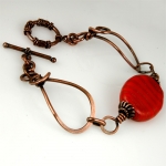 red_lampwork_bead_bracelet
